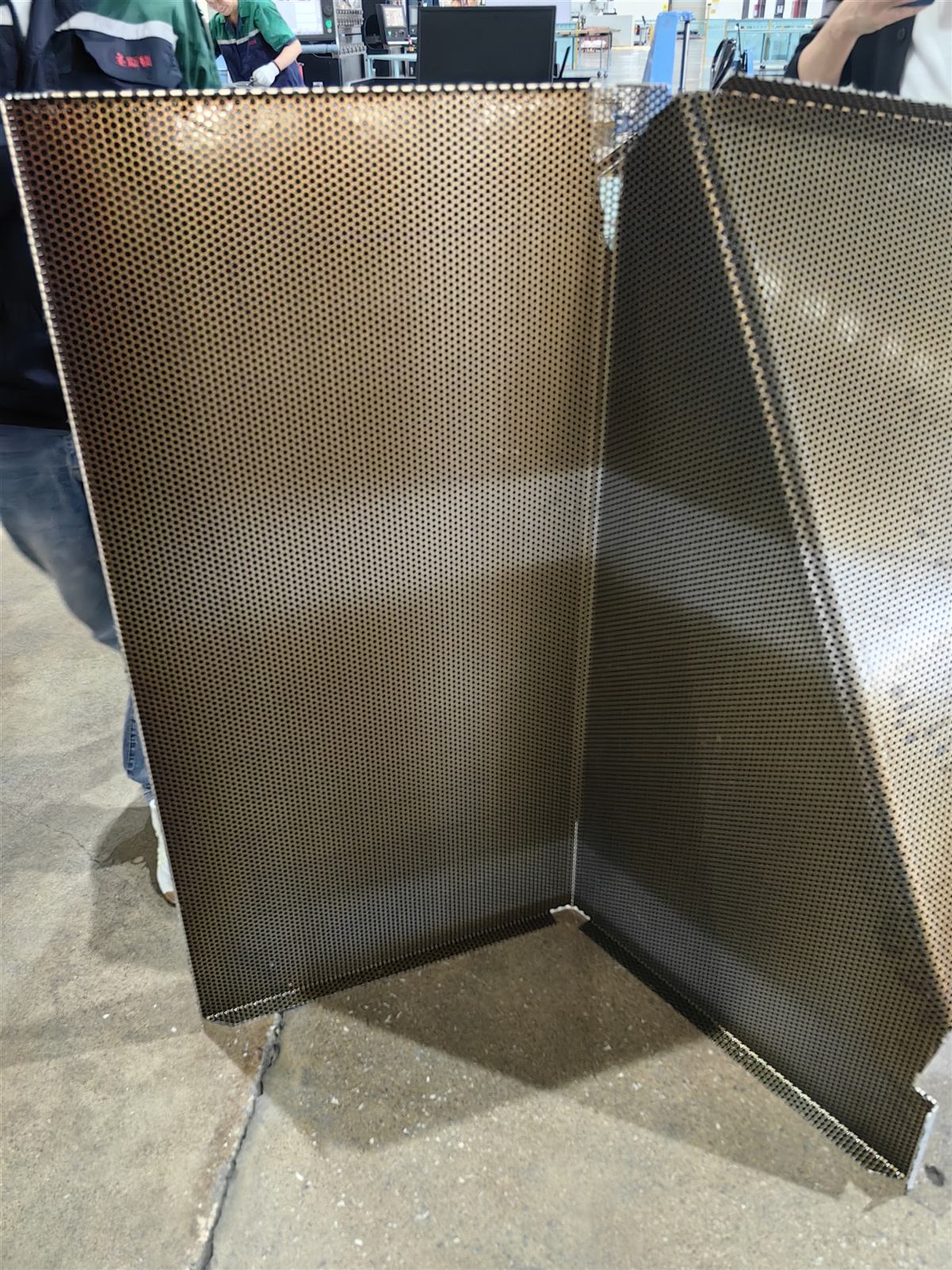 Folded stainless steel component after press braking