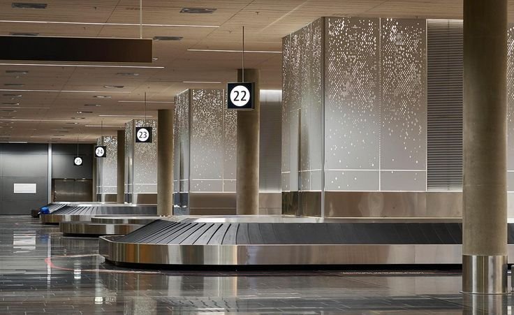 Metal ceiling system in a transport terminal
