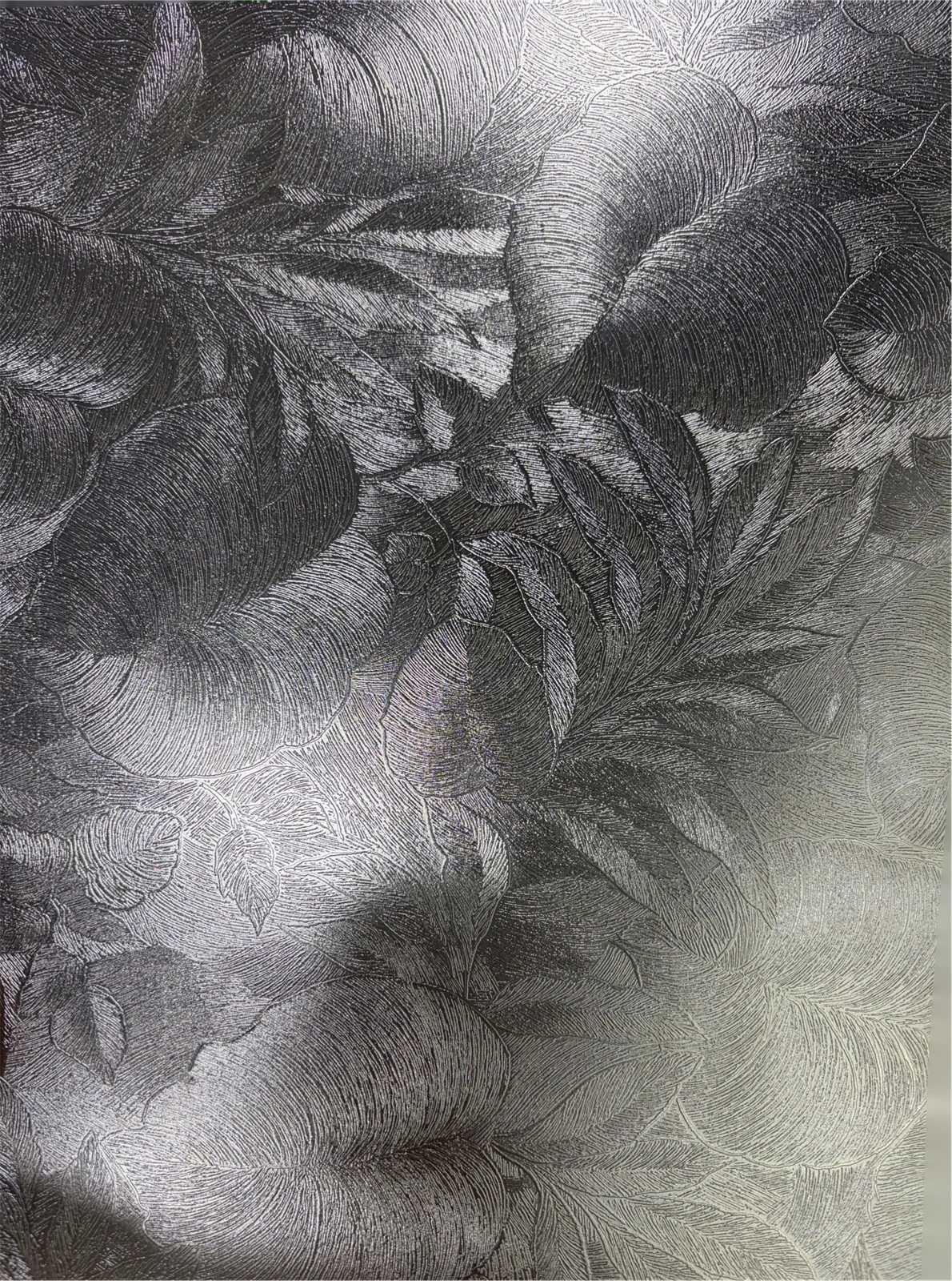 Custom embossed stainless steel with a project specific botanical relief pattern