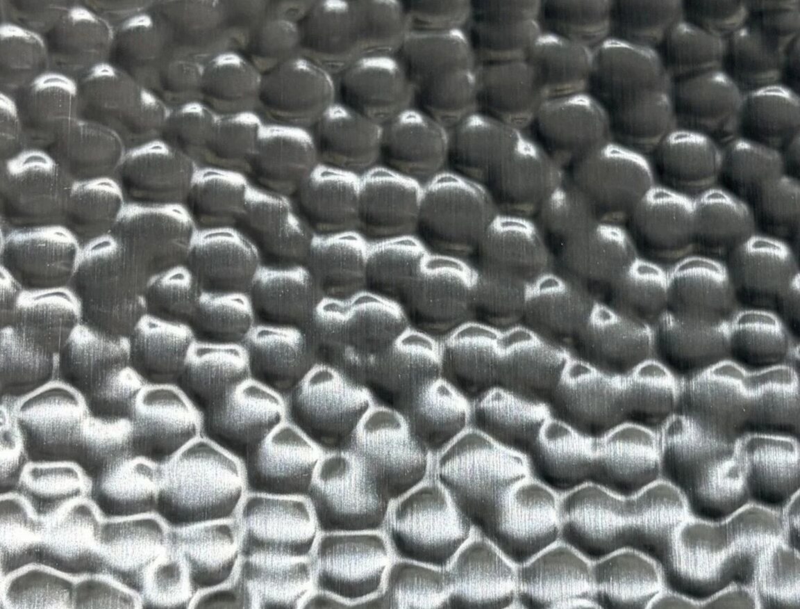 Natural stainless PVD tone on the same hammered embossed stainless steel texture