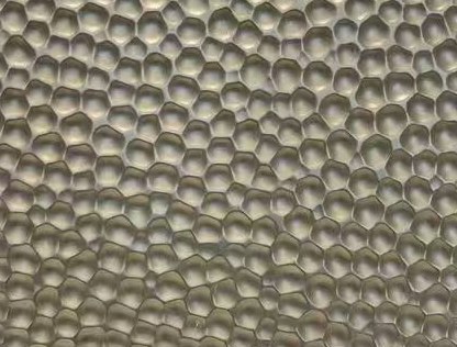 Champagne silver PVD tone on the same hammered embossed stainless steel texture