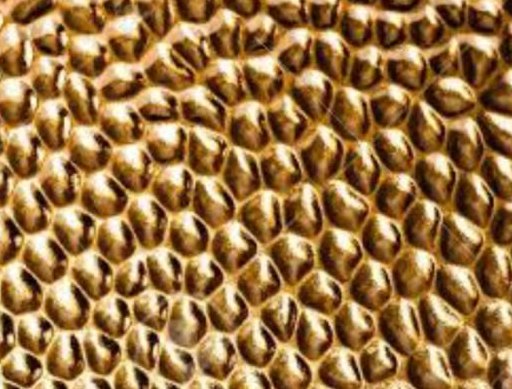 Gold PVD tone on the same hammered embossed stainless steel texture