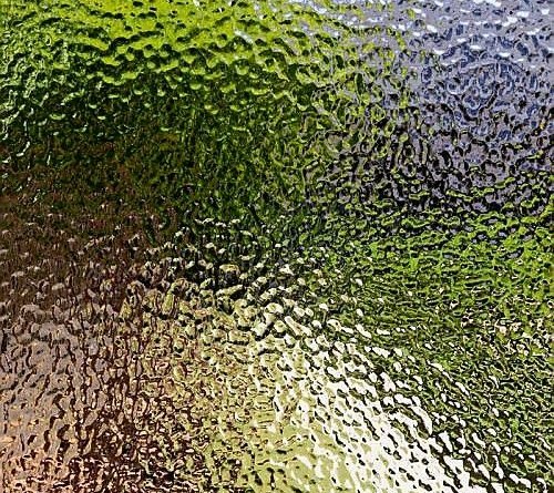 Water ripple stainless steel taking colour and movement from the surrounding environment