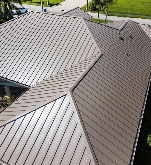 Continuous standing seam roof surface running across a large roof plane