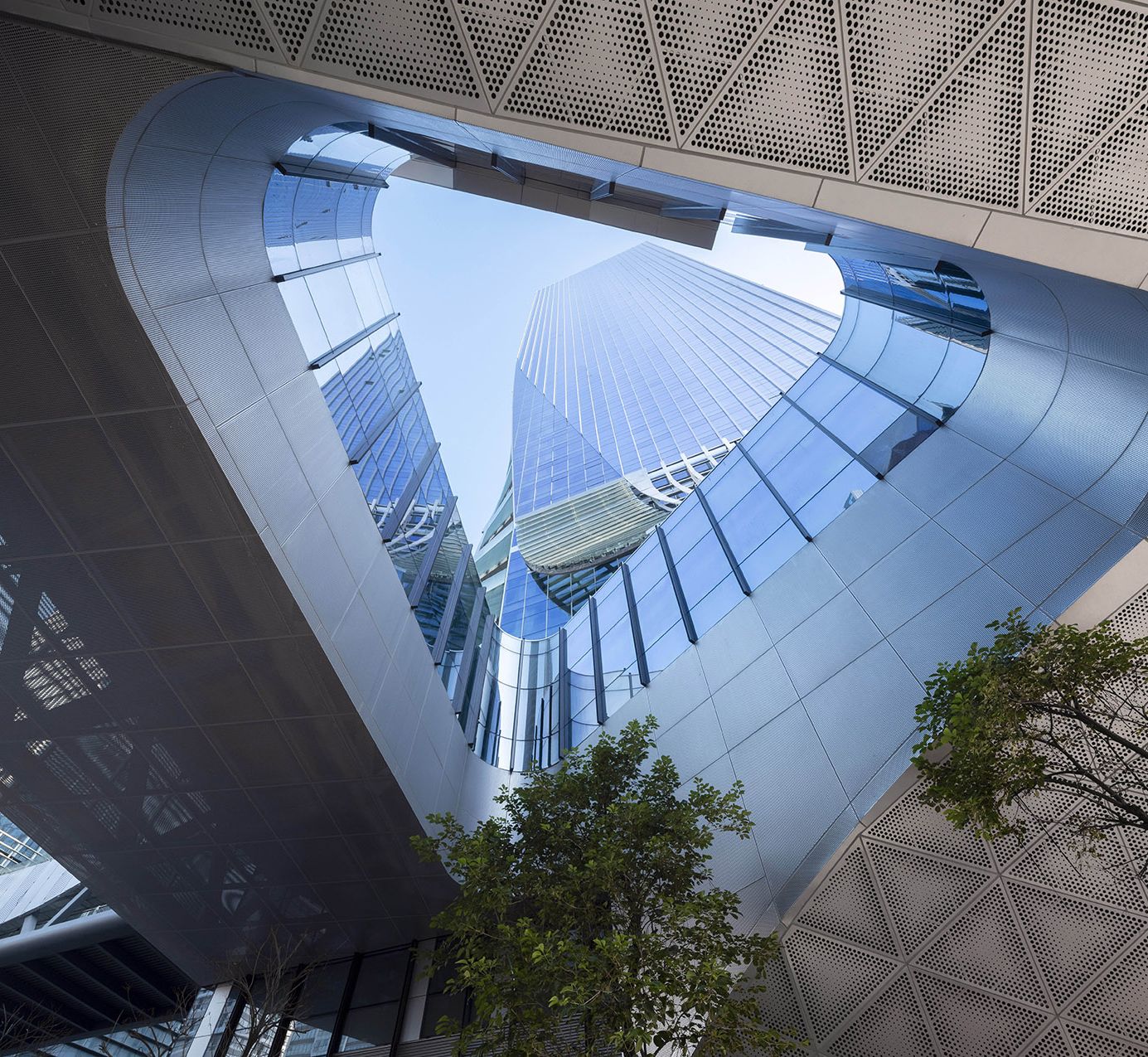Folded stainless steel canopy soffit and fascia return seen from below