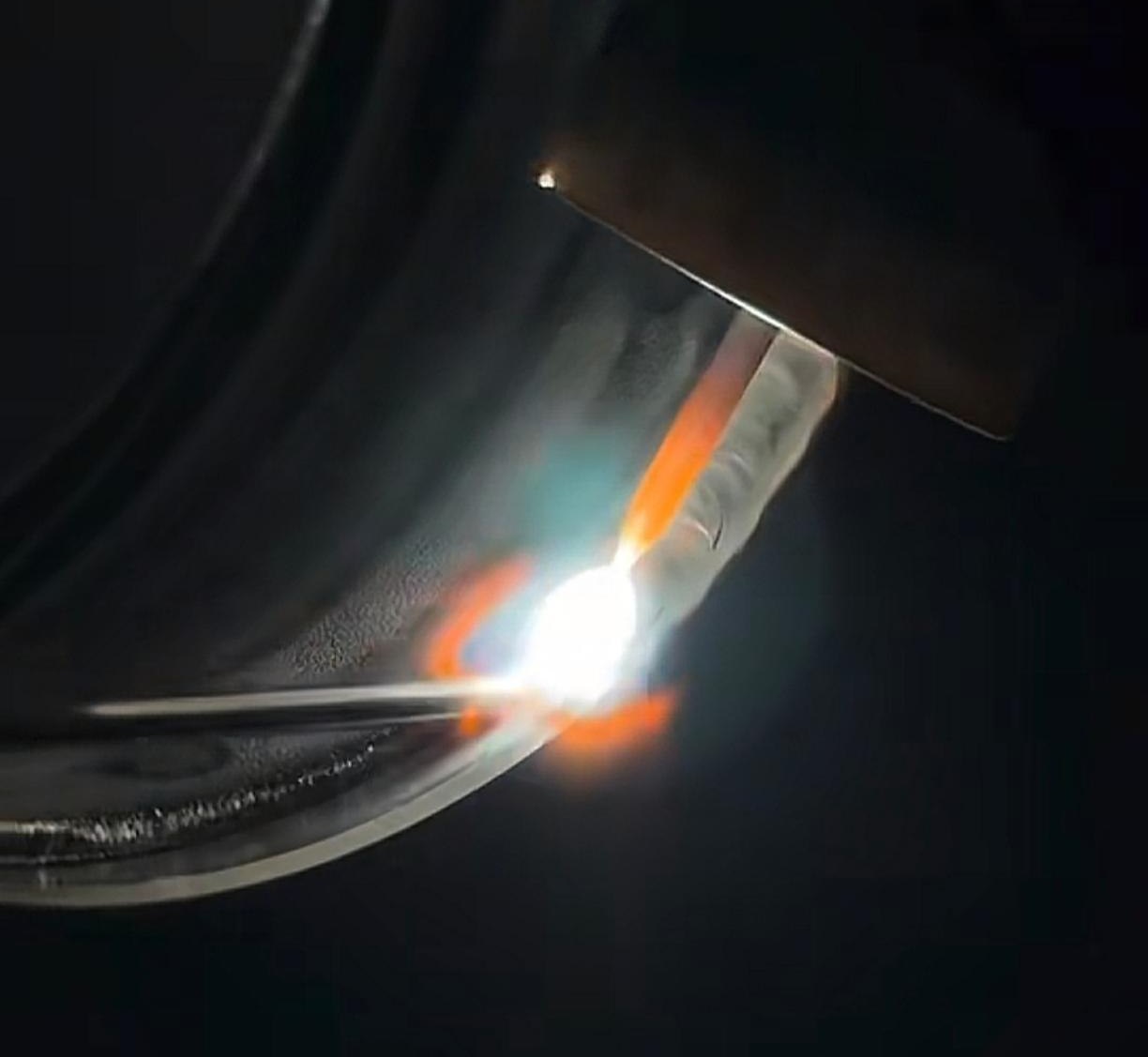 Welding and finishing a stainless steel entrance component in production