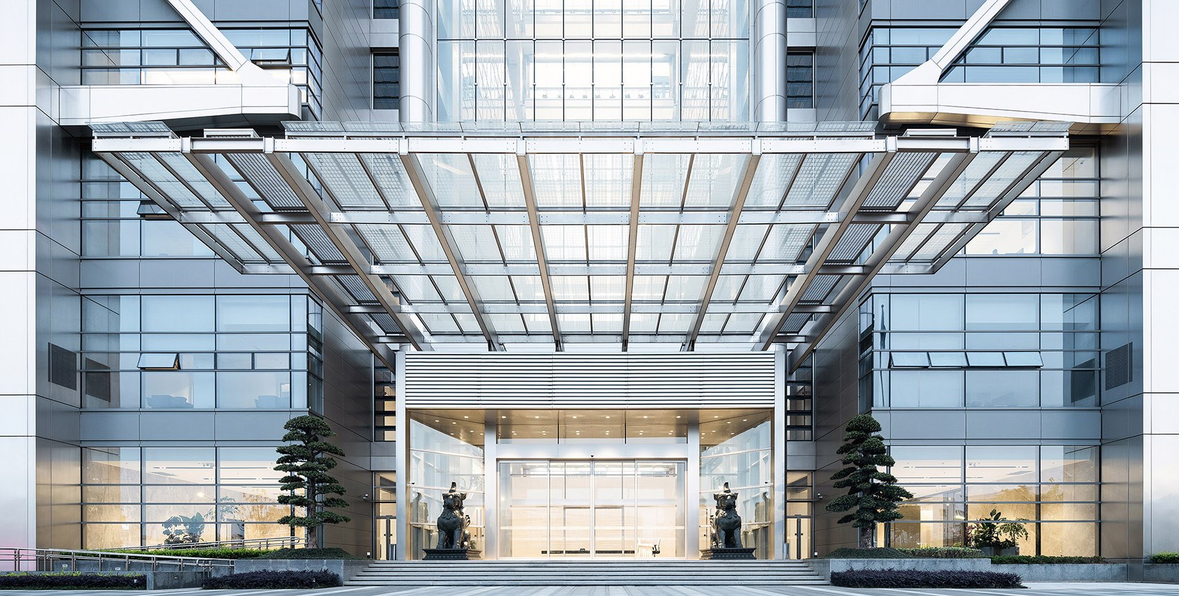 Corporate entrance showing canopy fascia, soffit, portal cladding and columns