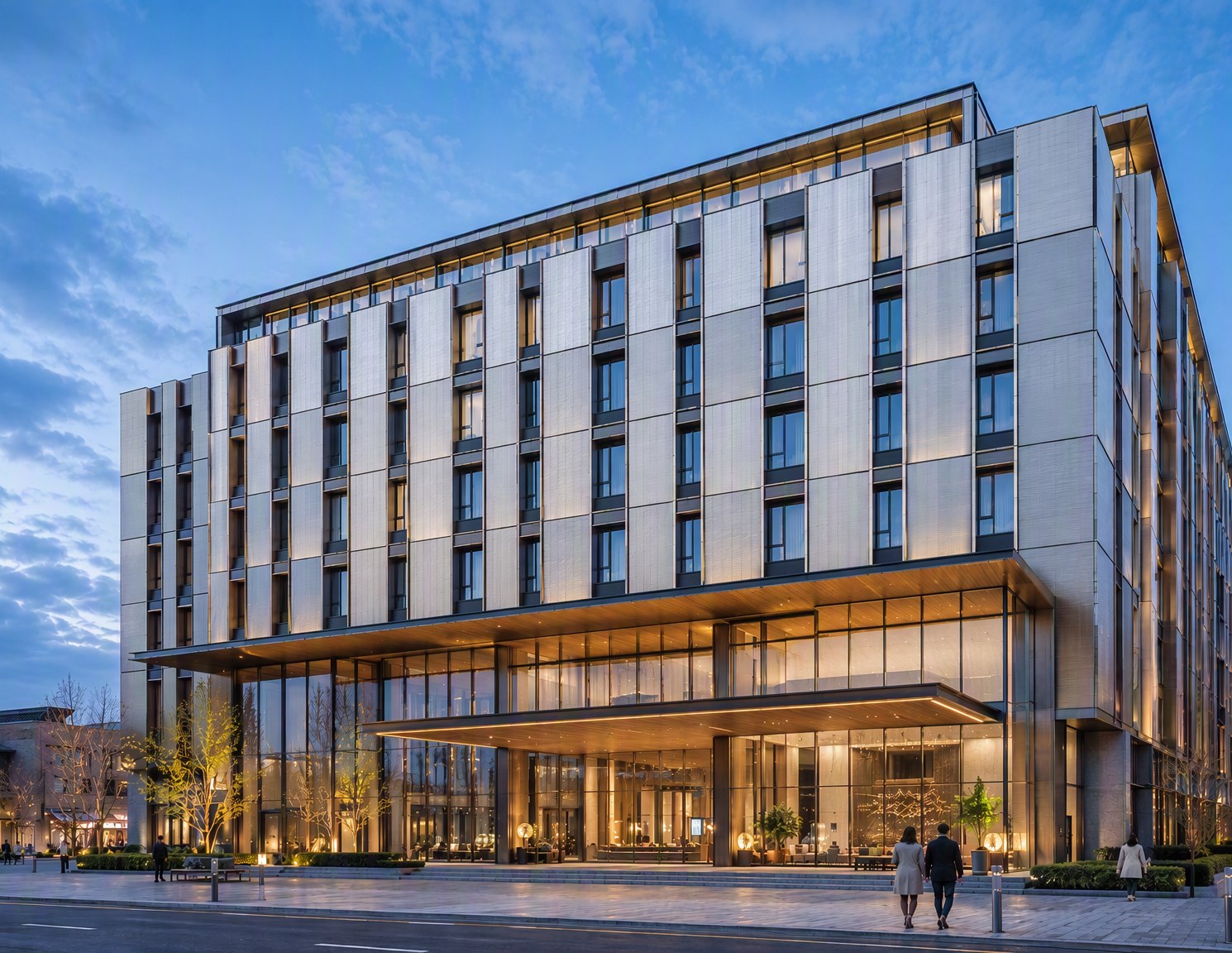 Hotel entrance canopy and portal cladding at street level