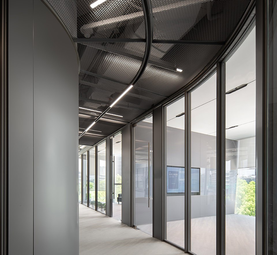 Finished stainless steel wall panels installed as a continuous surface
