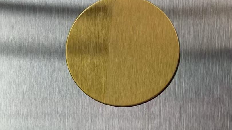 Physical stainless steel sample checked by hand before project approval