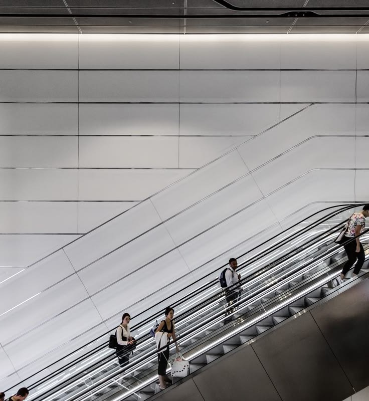 Mirror finished stainless steel surfaces extending the perceived depth of the space