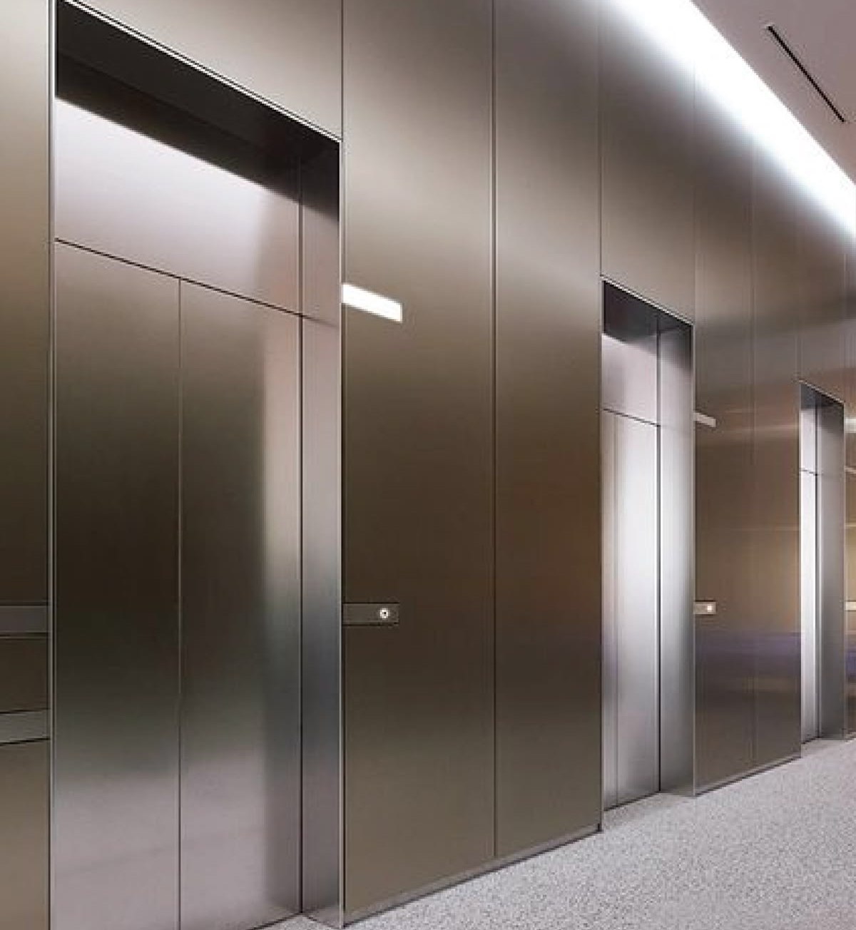 Satin stainless steel door and wall surfaces viewed at close range