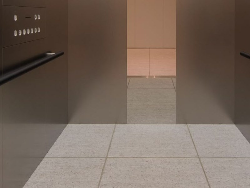 Satin stainless steel cabin surfaces in a high-touch area