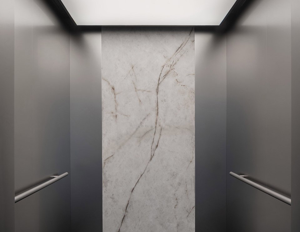 Marble and stainless steel elevator lobby in a commercial building