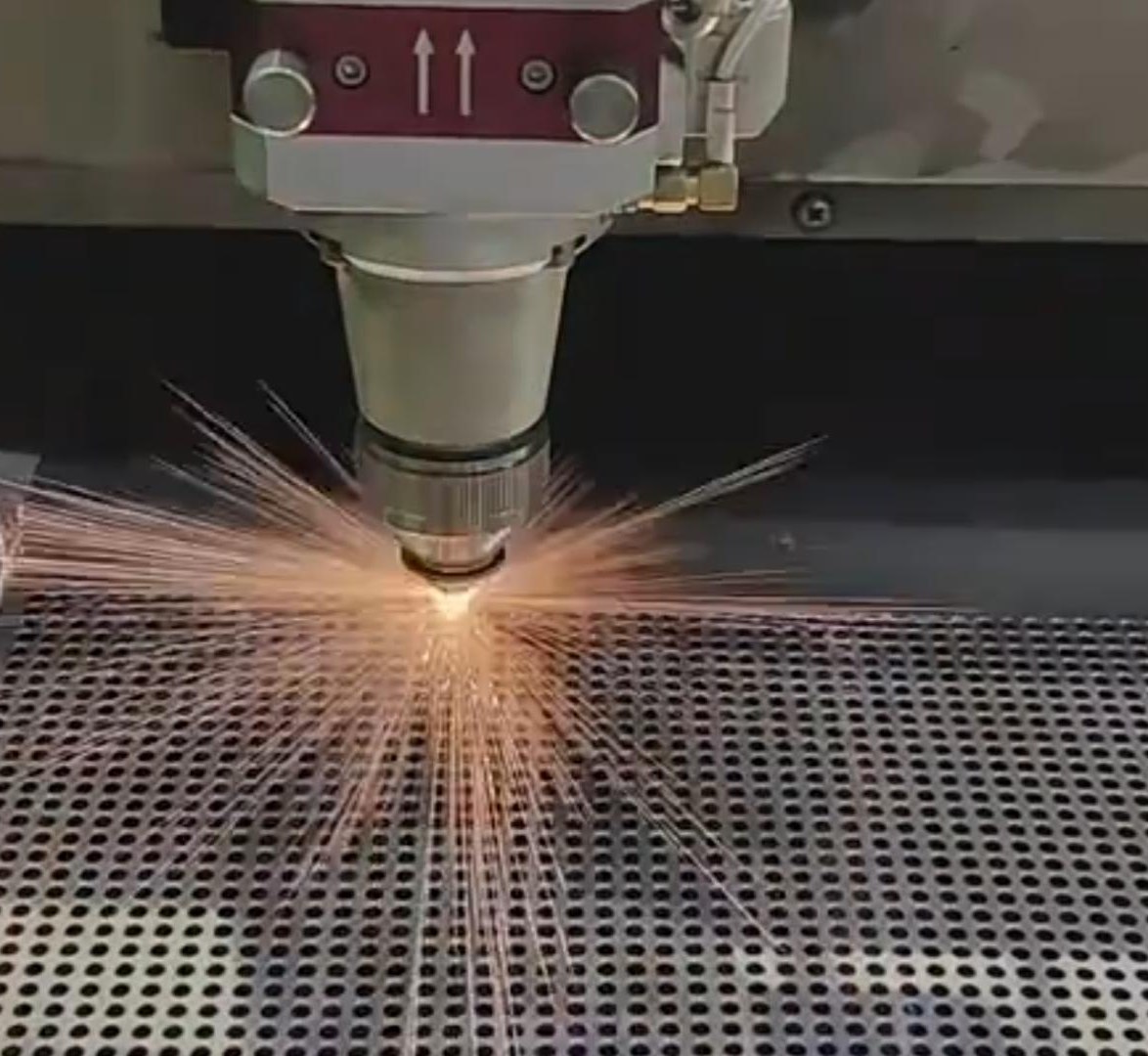 Laser cutting a perforated stainless steel component