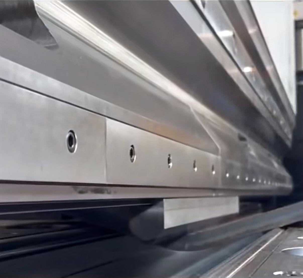 Press brake forming a stainless steel sheet into a bespoke component