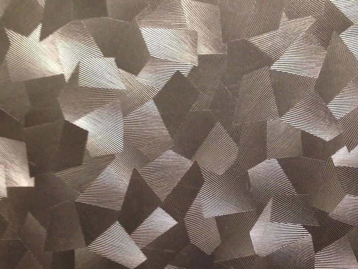 Physical embossed stainless steel texture with dimensional relief