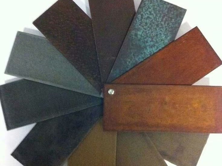Aged and weathered stainless steel surface treatments for specific project requirements