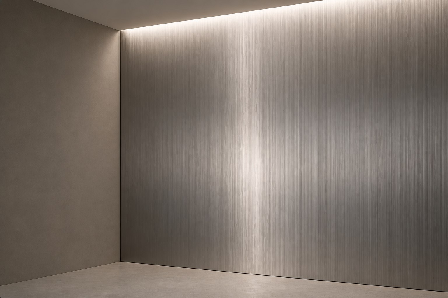 Brushed stainless steel wall panel responding to raking light along its grain