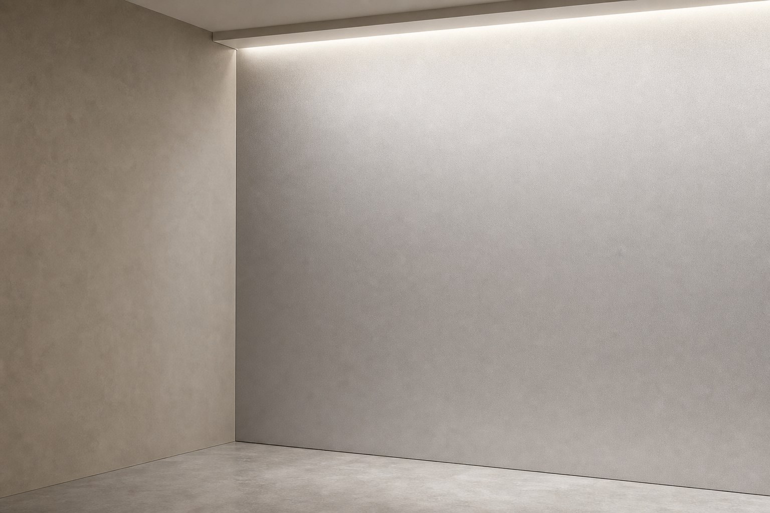 Bead-blasted stainless steel wall panel diffusing light into a soft even wash