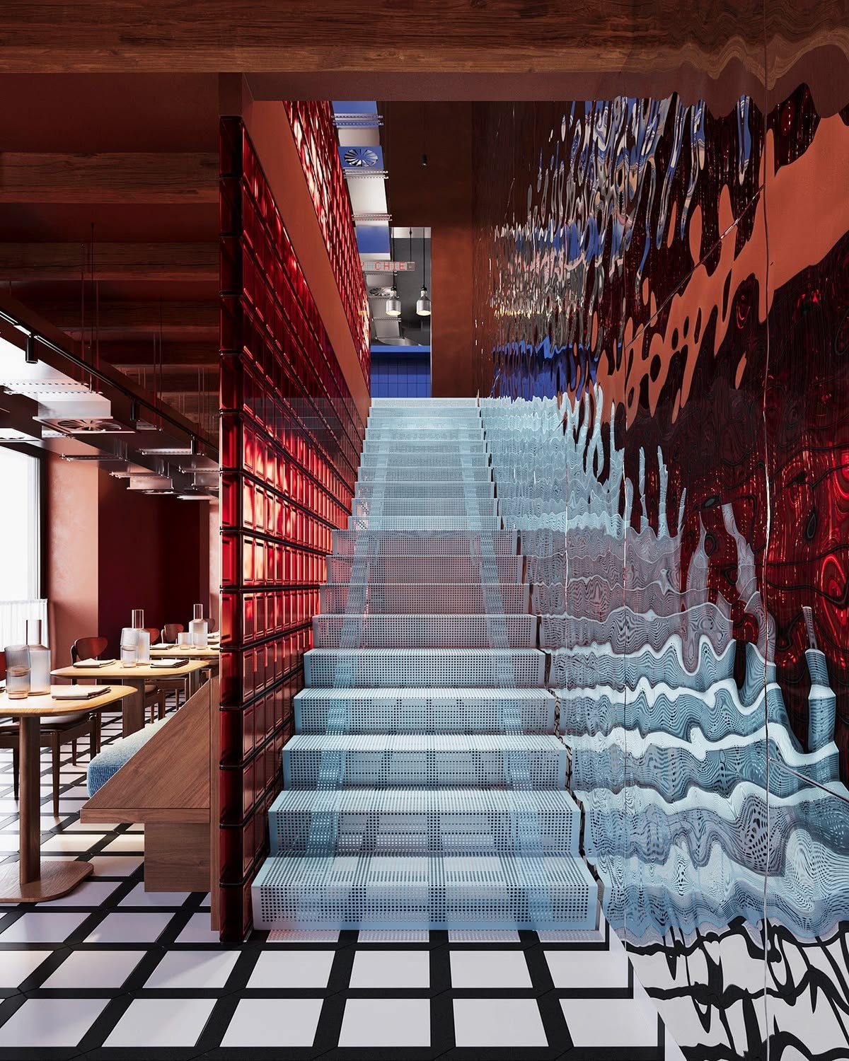 Mirror stainless steel wall transforming a solid boundary into visual depth