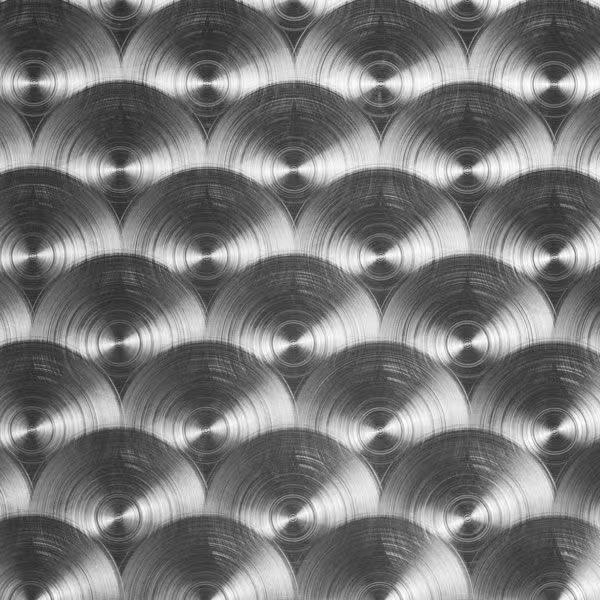 Brushed stainless steel with a controlled directional grain