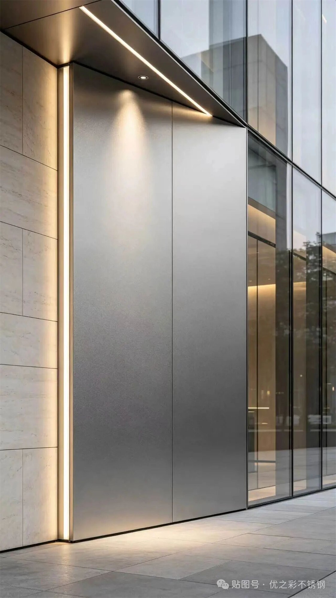 Curved wall clad in low-reflection stainless steel, keeping a large material plane visually restrained