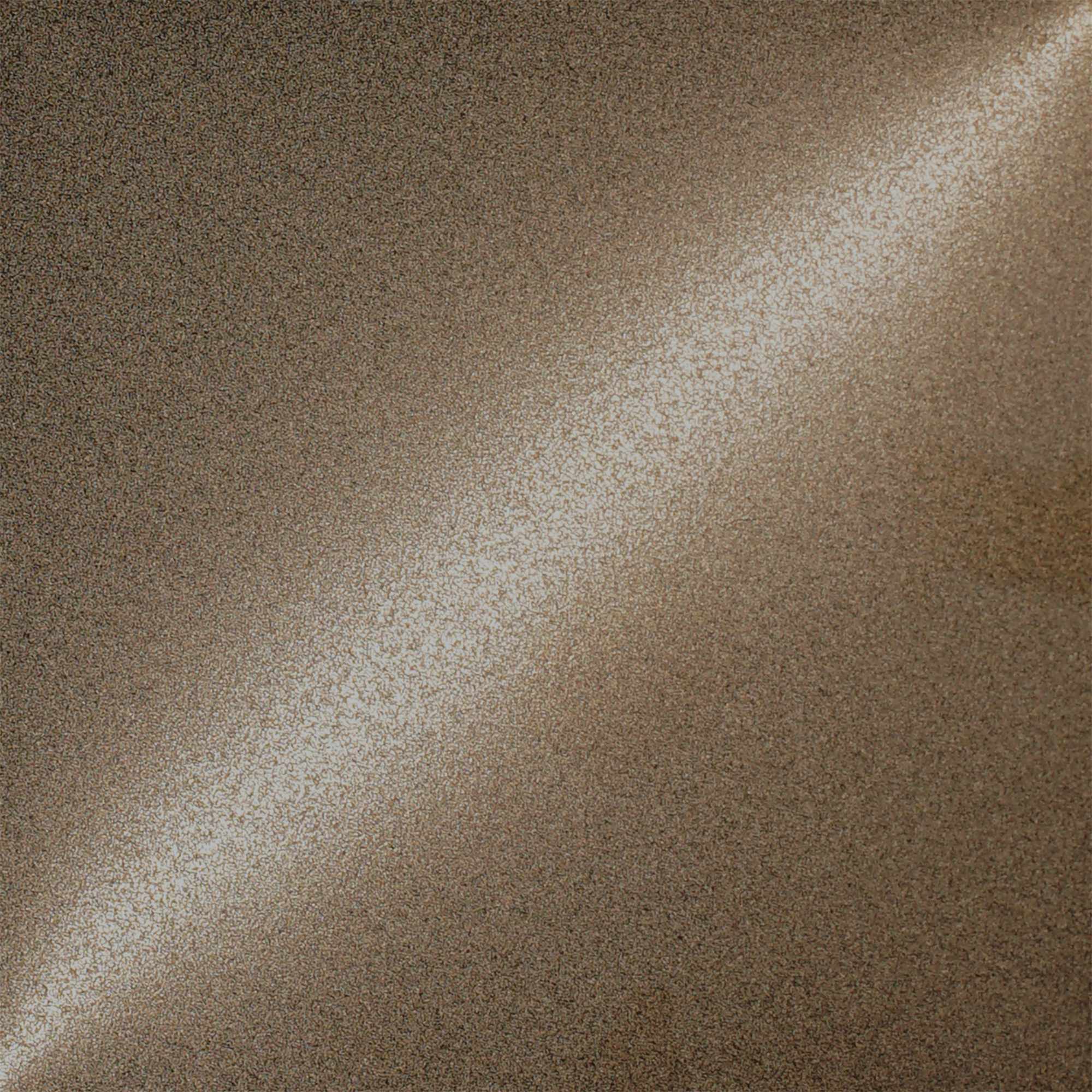 Champagne gold over a bead blasted base, a quieter and more restrained reading of the same metallic tone