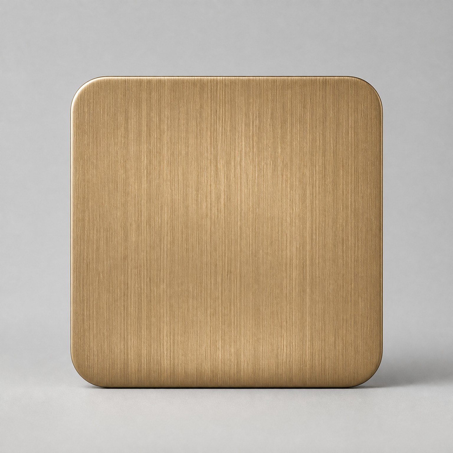Rose gold PVD color reference on a brushed stainless steel sample