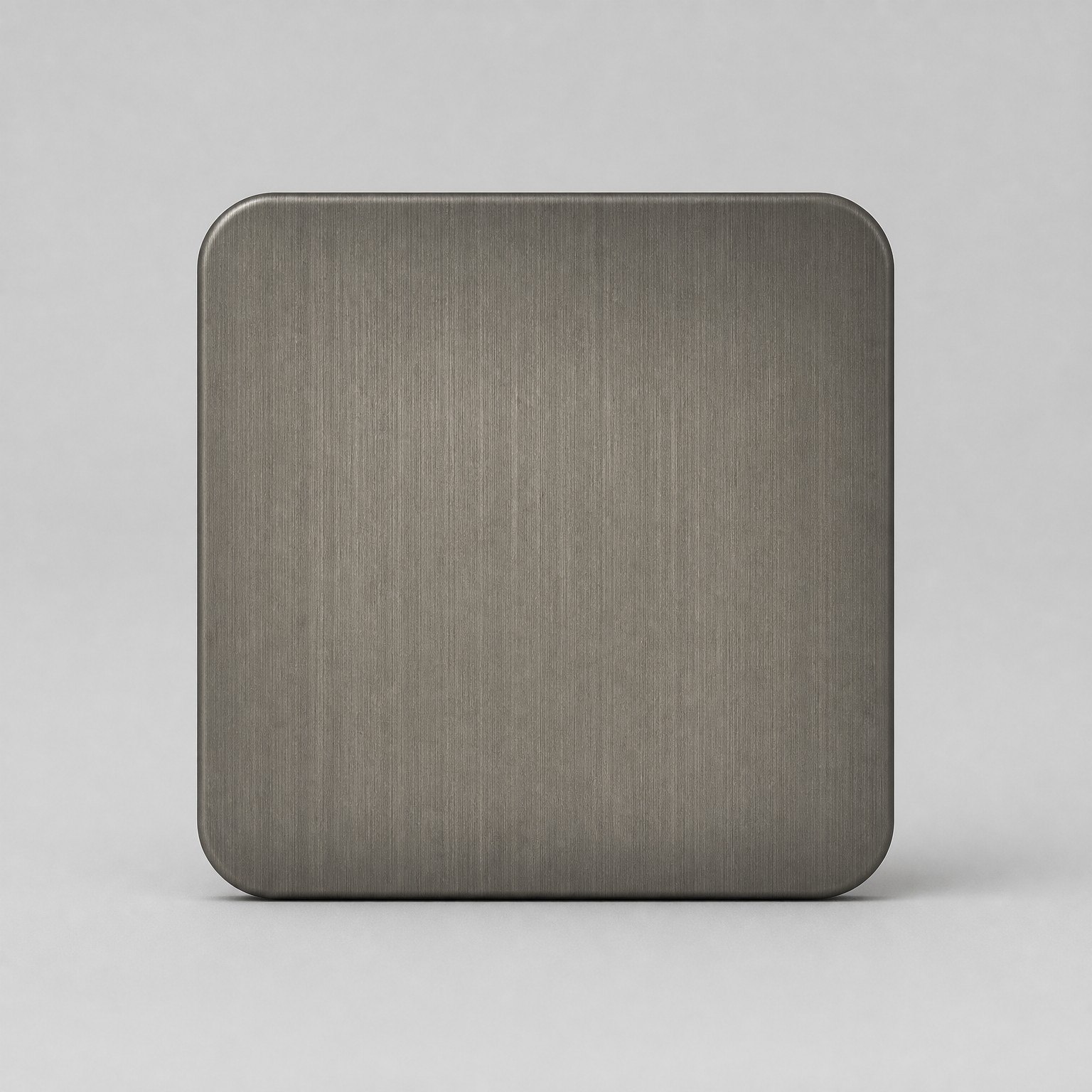 Grey titanium PVD color reference on a brushed stainless steel sample