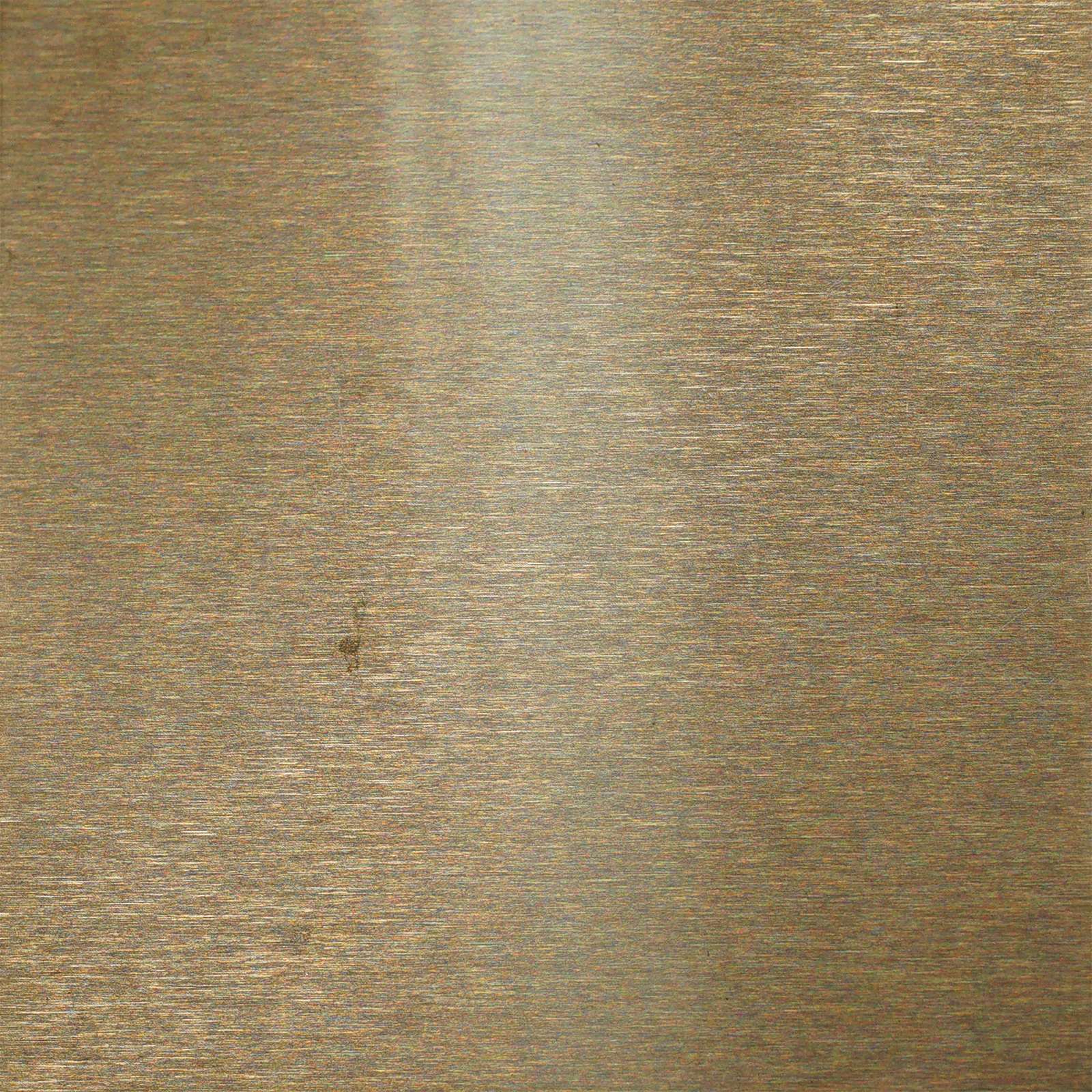 Champagne gold over a hairline base, the fine grain giving the color a controlled linear character