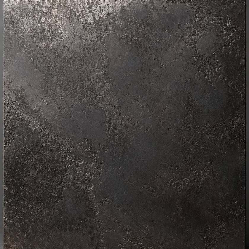 A dark mottled antique patina stainless steel surface