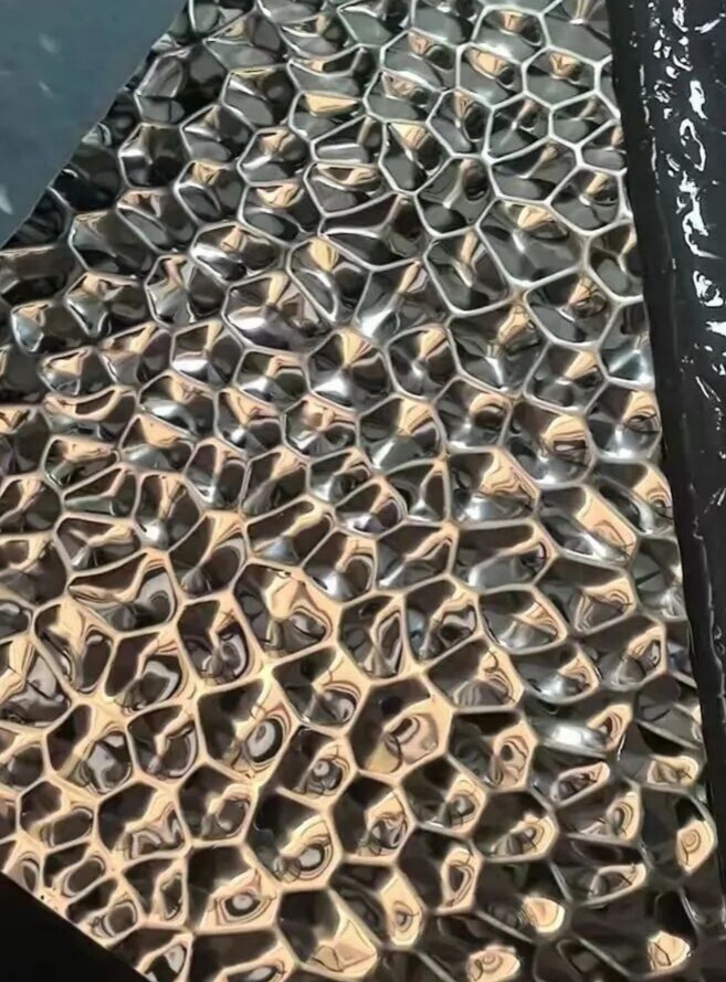 Hammered stainless steel with a tactile surface