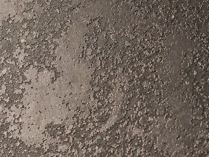 Close range tonal detail of an antique patina surface