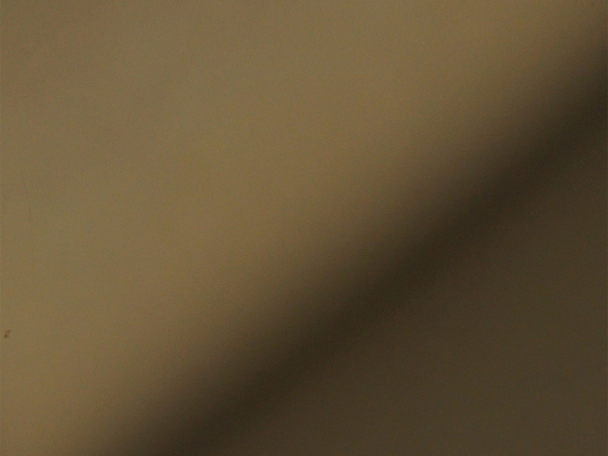 A champagne gold PVD colour coated stainless steel surface
