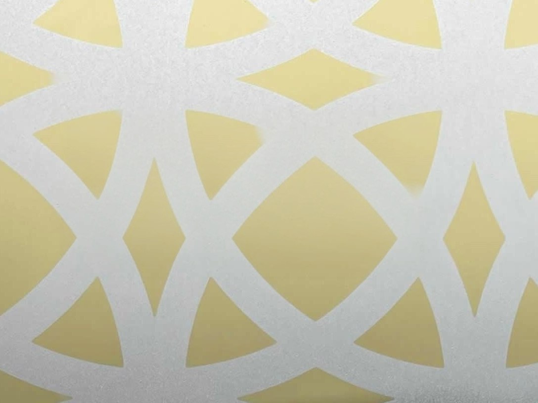 Gold etched stainless steel with a richer decorative metallic presence
