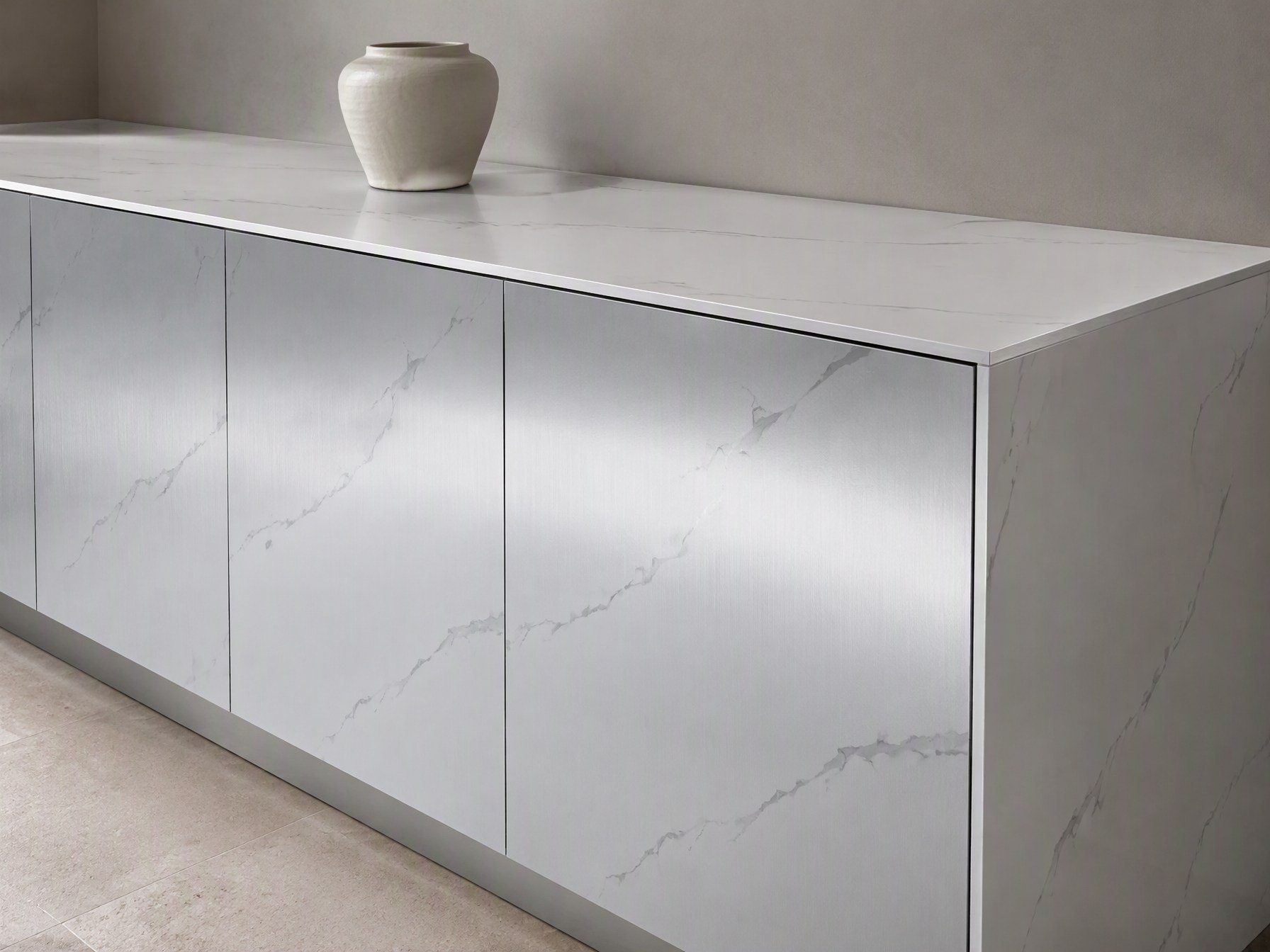 Printed stainless steel used across cabinetry and joinery fronts in a fitted interior