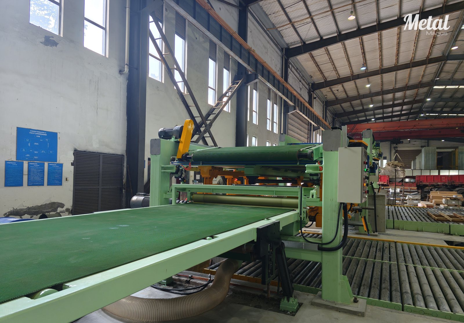 Cut stainless steel sheet on the outfeed table