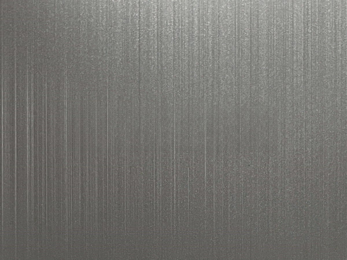 Long-grain hairline brushed stainless steel surface