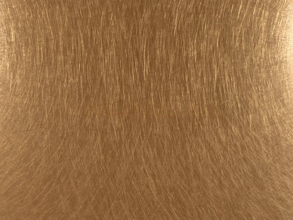 Rose gold PVD colour coated stainless steel surface