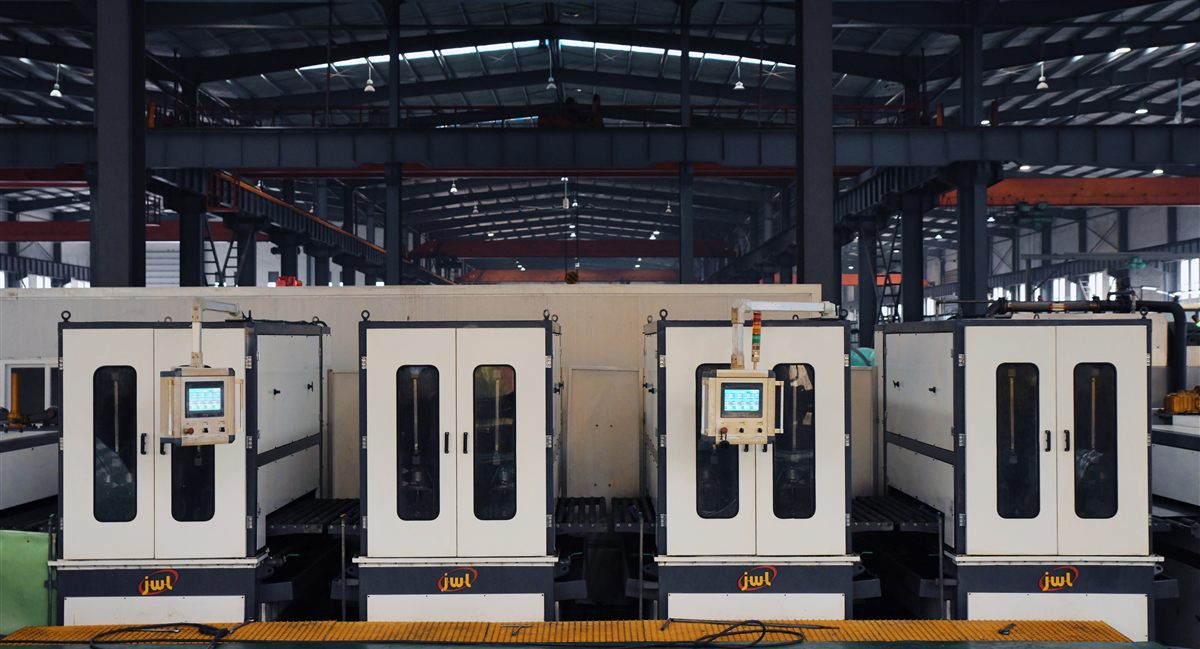Coil-to-coil grinding machine producing a hairline finish on stainless steel coil
