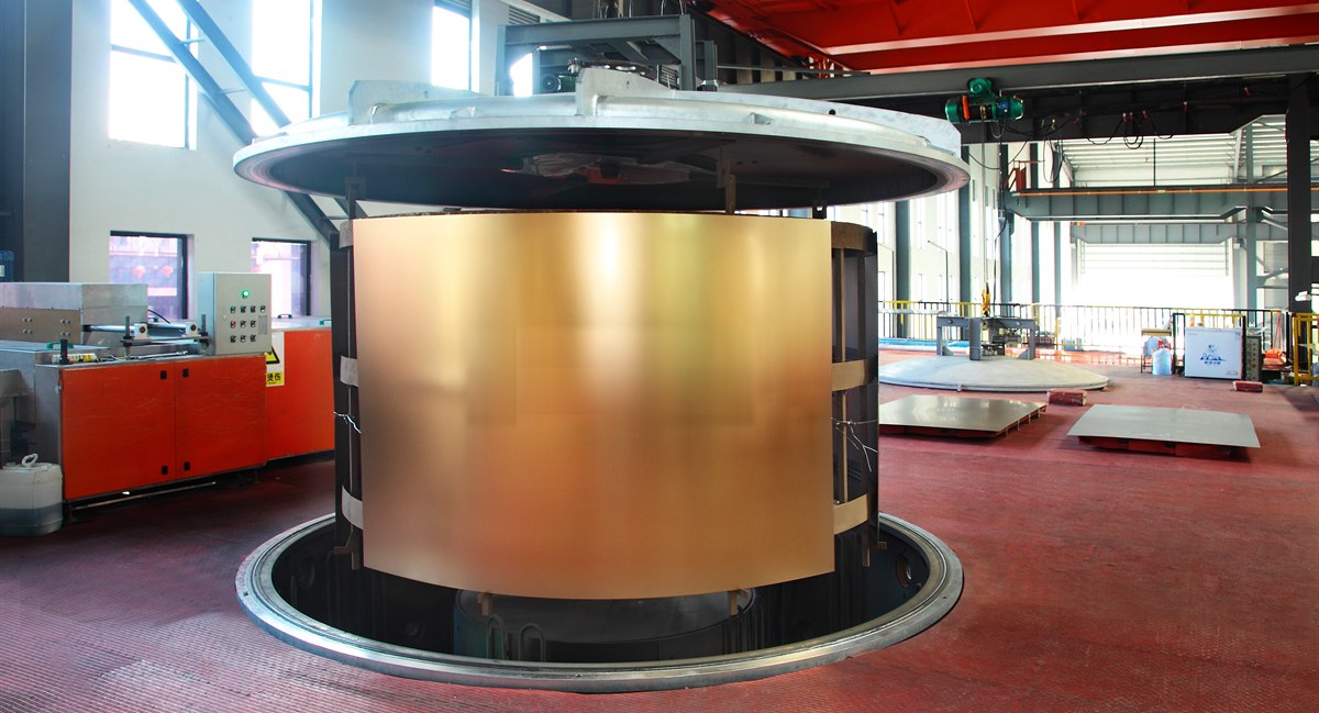 Gold PVD-coated stainless steel sheet mounted on the load fixture of the vacuum coating machine