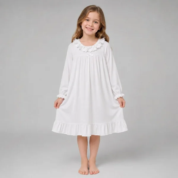 Girl wearing a white ruffle collar cotton nightgown from the kids sleepwear range