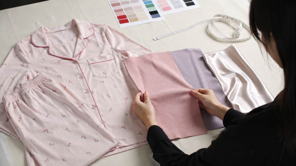 Cotton modal and satin fabrics compared when evaluating custom pajama manufacturing cost