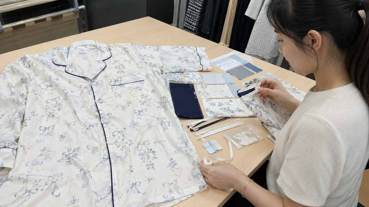 Custom pajama printing piping buttons and trims reviewed as garment production cost factors