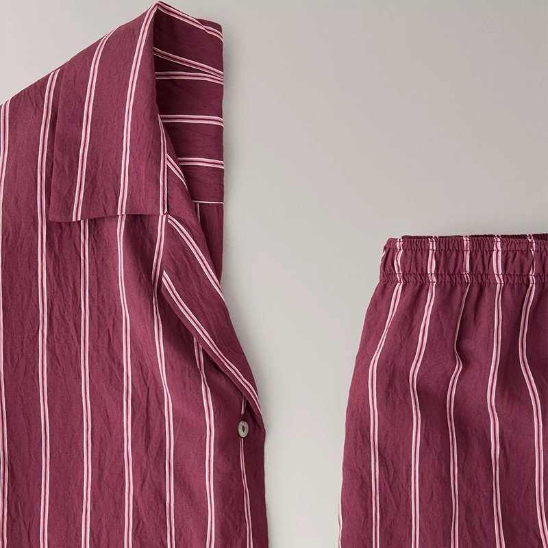 Burgundy bengal stripe woven cotton fabric with white piping and elasticated pajama pant waistband