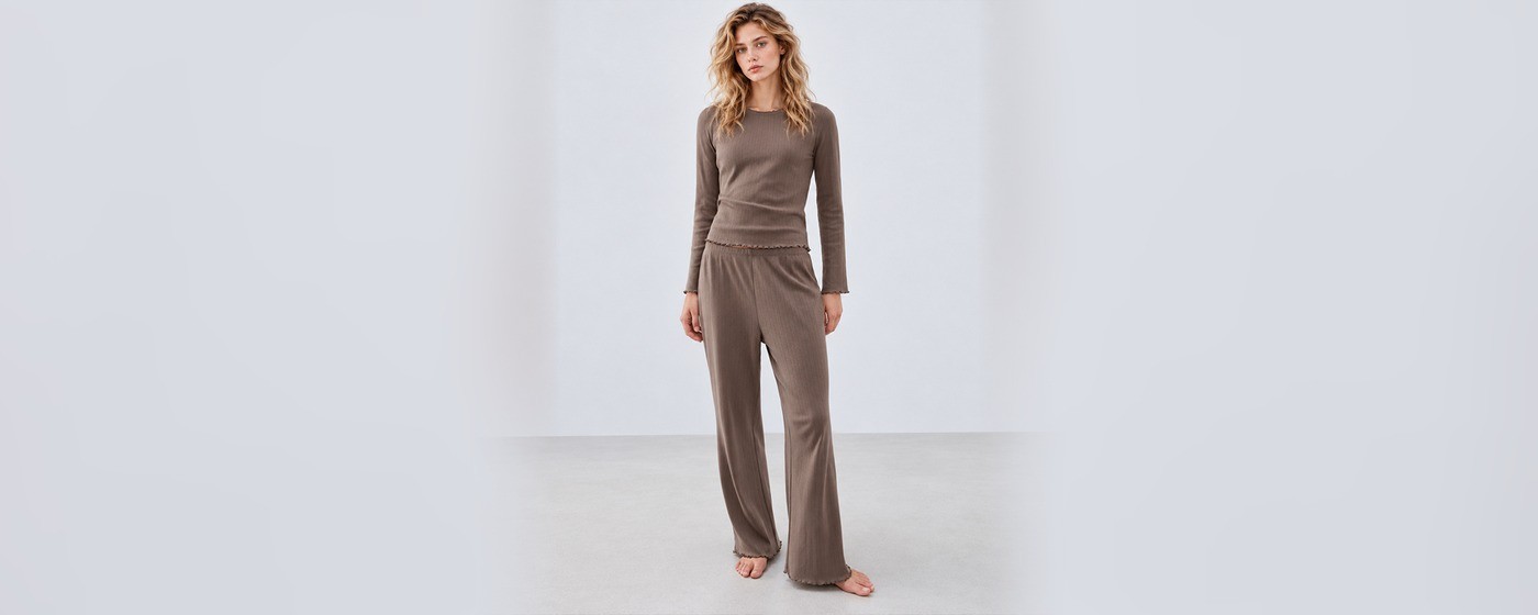 Taupe pointelle knit lounge set with a long sleeve round neck top and wide-leg pants for private label loungewear