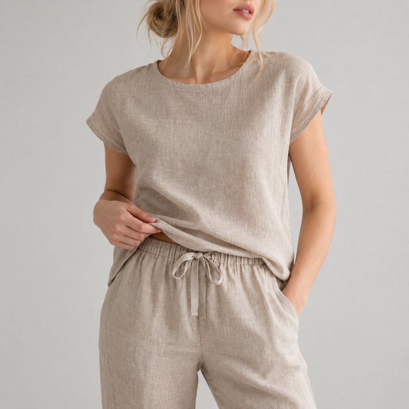 Close view of the slub yarn texture and drawstring waist on a sand cotton-linen lounge set