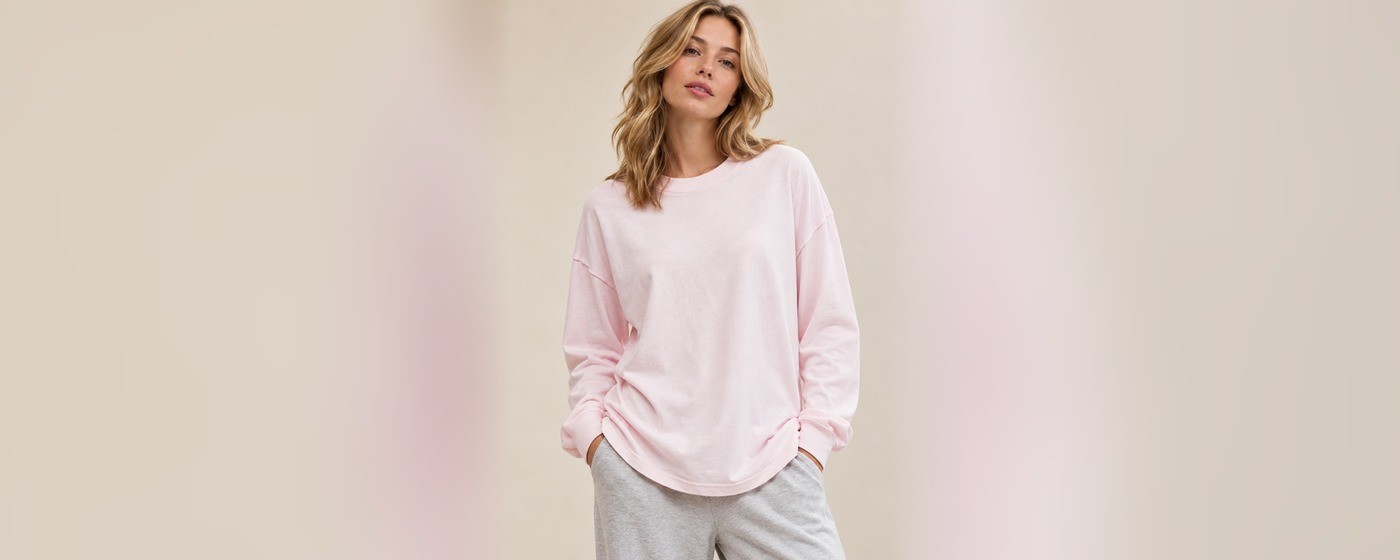 Pink oversized long sleeve sweatshirt with dropped shoulders and deep side slits for private label lounge tops