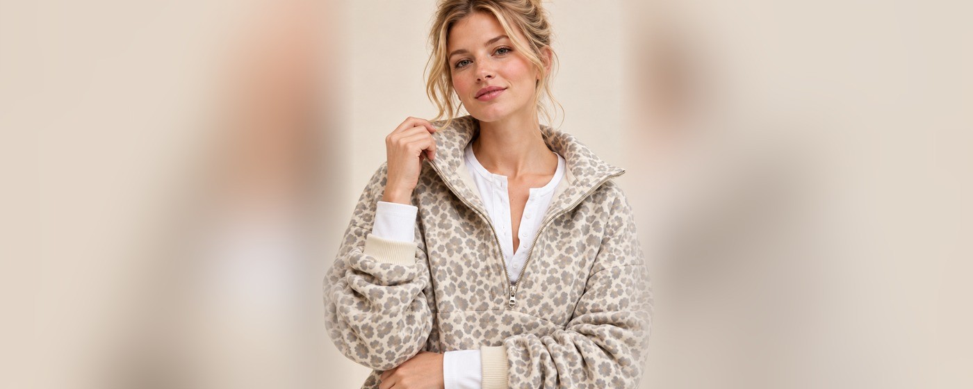 Leopard print half-zip hoodie and tapered jogger set with contrast cream rib trims for private label loungewear
